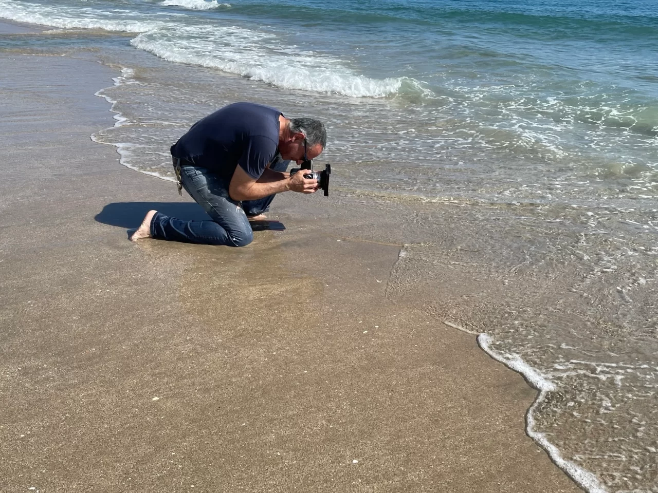 Frank Iannotti photographing surf at Delray beach FL